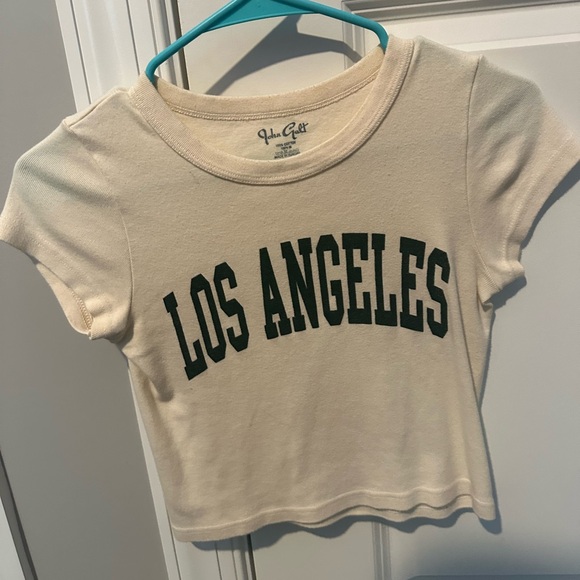 Brandy Melville Tops - Brandy Melville Cream Tee with Los Angeles Print